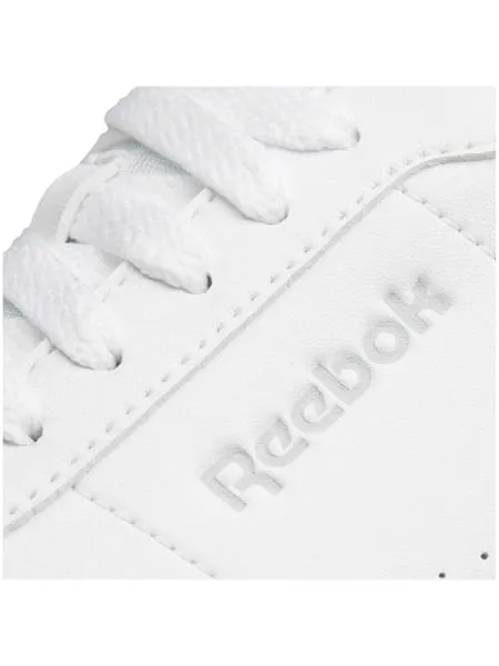 white women's Reebok Charm sneakers.